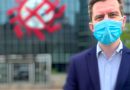 Zurich-Versicherung: Kein Covid-19-Sonderstatus mehr Covid Maske Bürogebäude